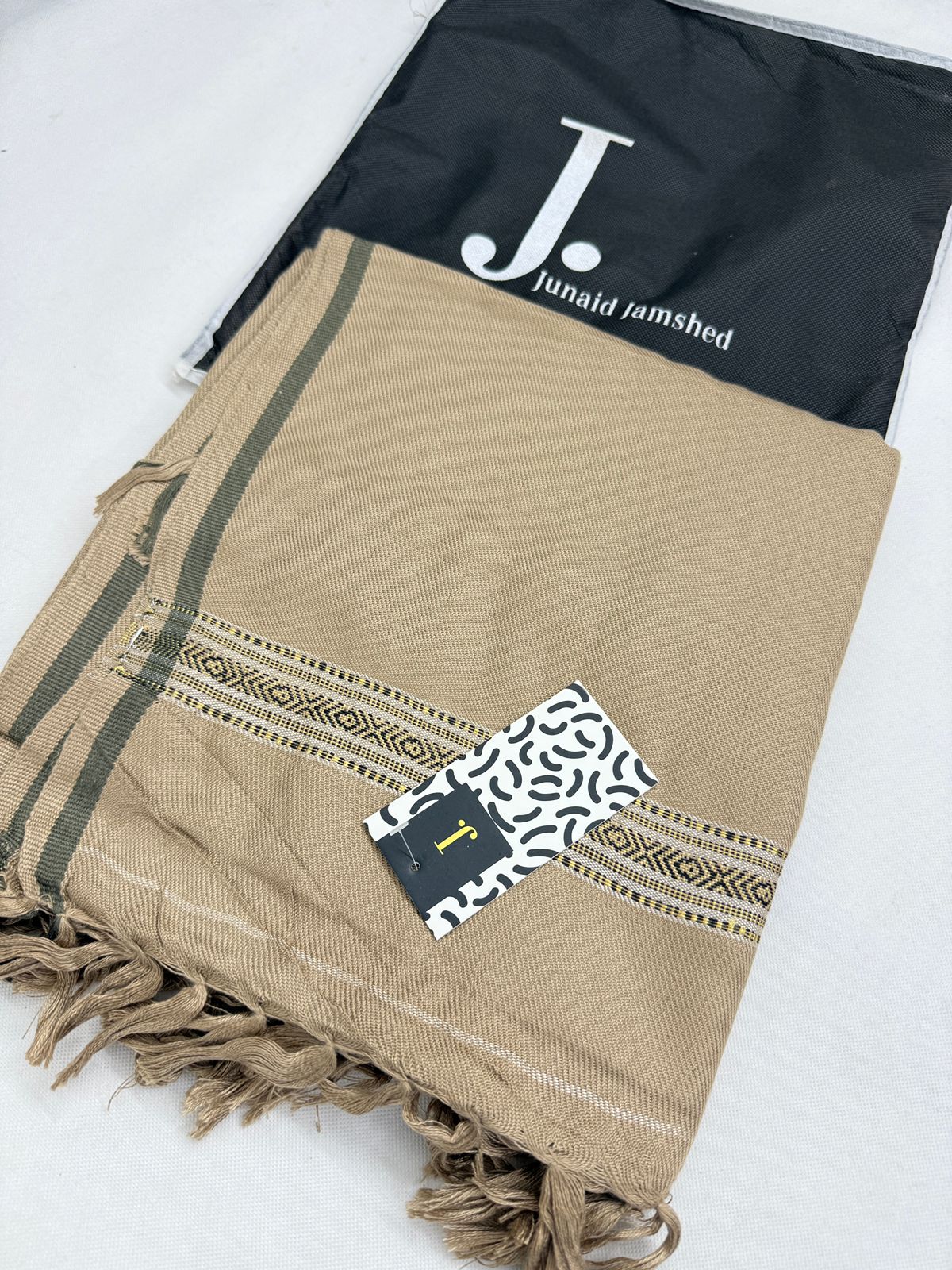J. SHAWLS