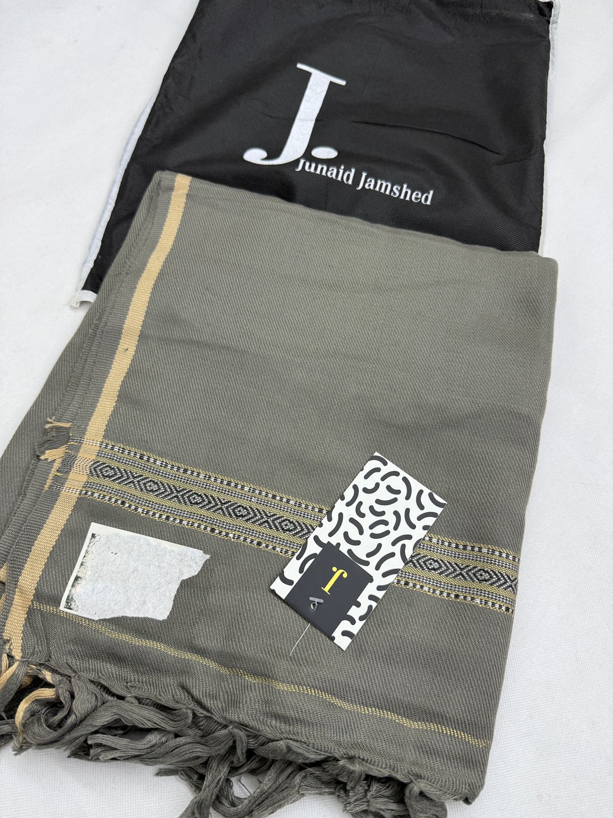 J. SHAWLS