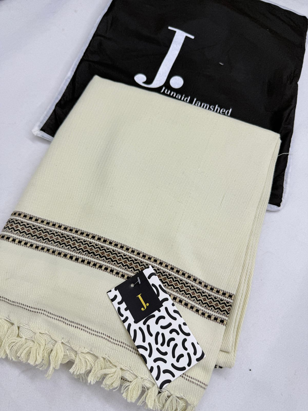 J. SHAWLS