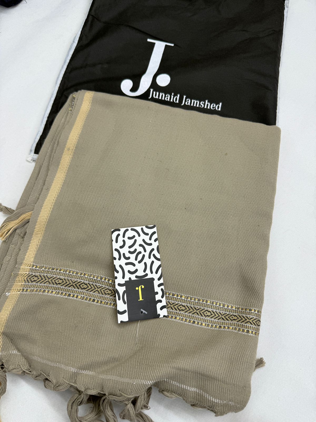 J. SHAWLS